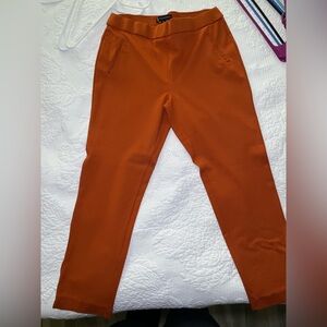 Orange never worn dress pants